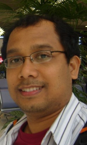 lecturer at FEUI, alumni of Fac of Humanities UI, dissertation on cultural identity in Riau