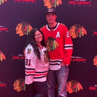 A graphic designer, photographer, and a die hard Hawks fan.
