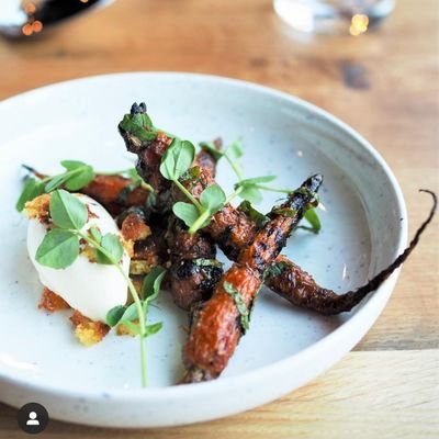 Shared plates tasting menu served up at 2436 14th St NW
