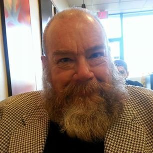 Retired professor; LGBTQ activist; friend of Dorothy; friend of Bill; Democrat.