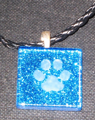 Artist creating work in acrylic, mosaic and jewelry.
Selling on Etsy under Four Paws Muse  
Active in animal rescue and creating animal themed jewelry