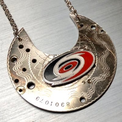 Carolina Hurricanes fan; jewelry maker; lover of great food & drink and best of all.... married to my best friend!