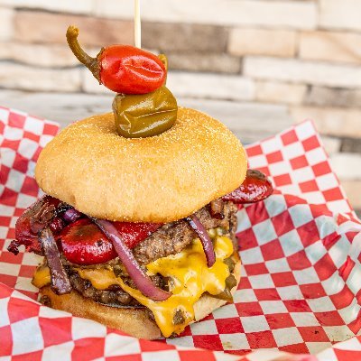 We are a Hamburger Restaurant with Giant TVs, Games, Specials and Beer and wine margaritas. We are family owned and need your support. 972 606 6700