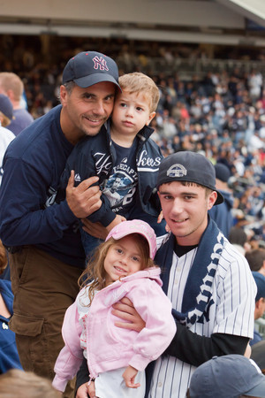 Big time Yankee fan.  Section 203 in Yankee Stadium is the best place in sports to watch a game.   Family, friends, laughs, hardcore fans.