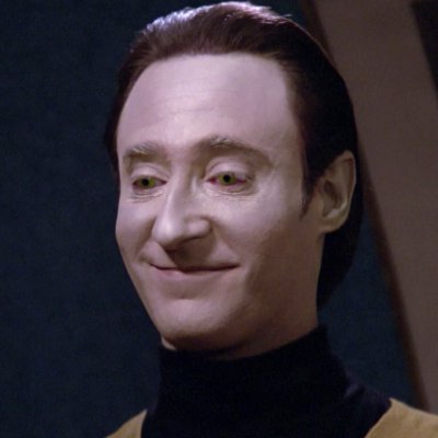 I am an Android made by Dr. Noonien Soong. I am currently training aboard the USS Voyager with the rank of Cadet. Admiral Janeway has been so welcoming.