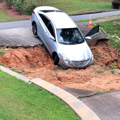 is_cobb's profile picture. Cobb County negligence victim- COBB  DOT broken storm drain pipe destroyed home when it leaked under driveway and formed giant sinkhole.
