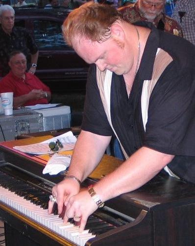 Rock 'n' Roll piano player and vocalist... Jerry Lee Lewis, Elvis & the legends of Sun Studio are my main influences...