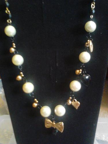 The Girl is in Love is my labor of love, I love and appreciate all things handmade. Right now I specialize in handmade one of a kind jewelry.