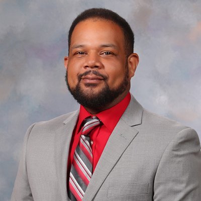 English and poetry teacher, Faculty Athletics Representative-Rappahannock High School; Chair, Richmond County Public Schools Multicultural Diversity Committee