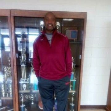 Head men's basketball coach of the Earle Bulldogs/Teacher/Mentor/FedEx delivery driver