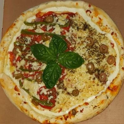 Pizzas caseras, con el mejor condimento y escencia de mucho amor.