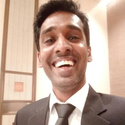 AnandanGaneshan's profile picture. Green orinted 💚💚