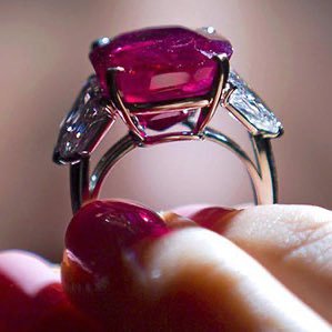 The Sunrise Ruby is the world’s most expensive ruby. The certified untreated Burma ruby is set into a Cartier ring and flanked by white diamonds.