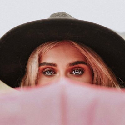 claudiamoye's profile picture. You're never fully dressed without a smile