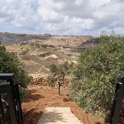Fully air-conditioned holiday home in Munxar, Gozo. 4 bedrooms, 3 bathrooms, large private pool, garden with views, BBQ, WiFi, private parking, satellite TV