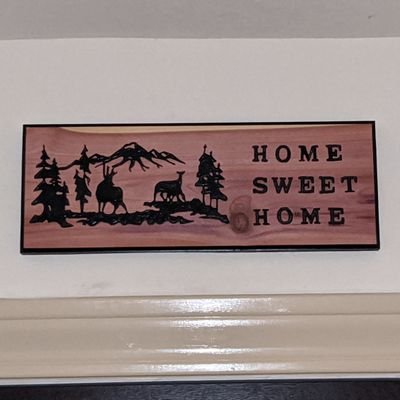 I make custom hand made wood signs. all signs are carved freehand with a router. ask I bet I can make it