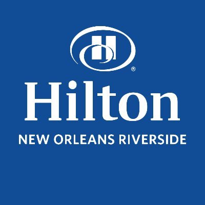 Hilton New Orleans Riverside, a downtown hotel on the banks of the Mississippi, where distance is measured in footsteps not cab fare.