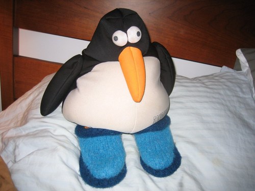 I am a penguin, accountant, and fan of giant calculators. I have an orange carrot nose, and I enjoy flopsy-foot rubs.