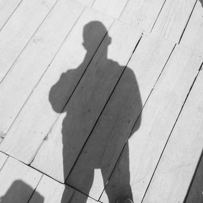 man behind the shadow