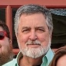 Summer: Dark rum over ice.
Winter: Single malt, water side.
Love my dog and wife and a good cigar. Never go anywhere without golf clubs or Browning Hi-Power.