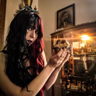 I am a model and photographer who enjoys the dark and twisty with a splash of risque