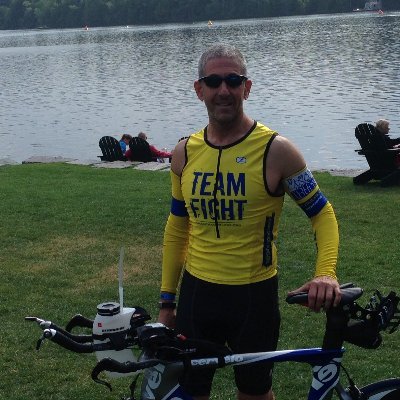 husband, father, grandfather, cardiologist, avid cyclist, and Ironman triathlete
