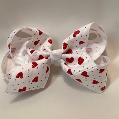 Hi, I'm Debbie and love making beautiful hairbows, Please stop by my Etsy shop and have a look around. I’m always adding new bows. all different sizes.