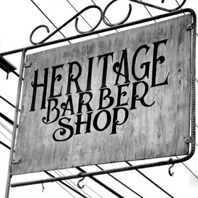 Traditional barbershop offering haircuts and hot shaves.