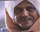 بلادي وان جارت عليّ عزيزة .....
       واهلي وان ضنوا عليّ كرام