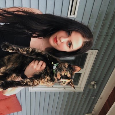 girl who probably tweets too much about her cat