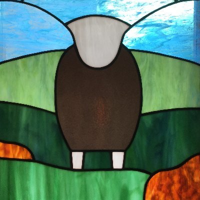 Copper foil stained glass artist specialising in making designs using discarded glass bottles found in the Lake District and along the river Caldew.