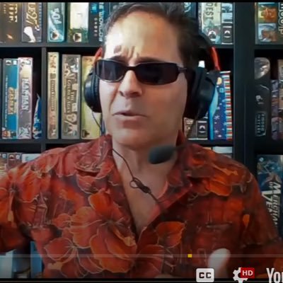 The Podfather, Stephen Buonocore, is a hobby game entrepreneur, game media personality, and game industry veteran. He retired in 2020 from Stronghold Games.