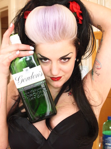 I am a Pin Up & Fetish Model & Dancer & Party Animal from the UK