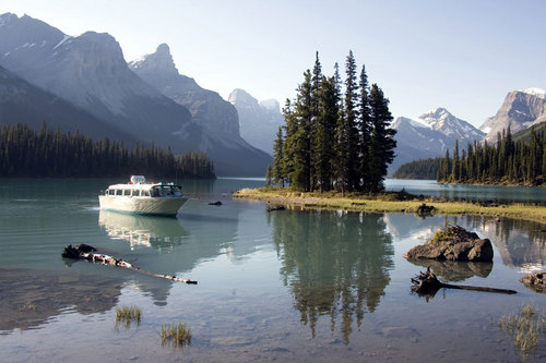 Carved by glaciers, the largest lake in Jasper National Park, home of Spirit Island and the Hall of the Gods