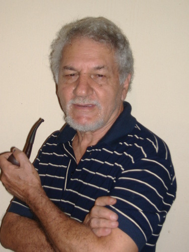 Historiador, ex-professir, escritor, heraldista, membro da Academia de Letras e Artes do Centro Oeste,
