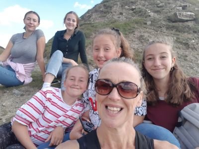 Cake baking, child raising, horse riding, netballing, dog walking, scrabble playing beach lover.