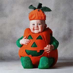 I am a baby in a pumpkin costume