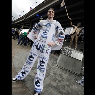 Canucks TowelPowerMan wearing the Vancouver Sun dubbed Towel Power Suit before Round 1 Game 1 vs Dallas, April 11 2007. It worked! The suit is ready for 2011!