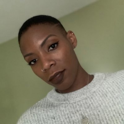 That tall, bald chick