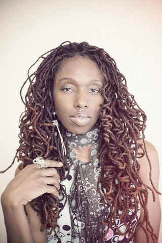 Photographer | Stylist. Natural hair advocate. A simple, modern-day hippie, vintage loving girl who embraces all things Photographic/Art/Style and Fashion.