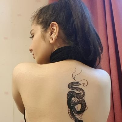 Girl with snake tattoo