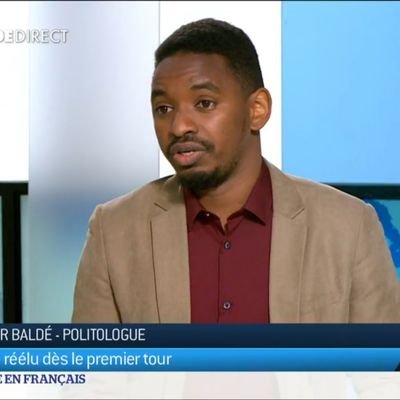 Politologue, Docteur en Science politique.