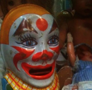 Humor blog devoted to my fixation with clowns, dolls, and odd signage.