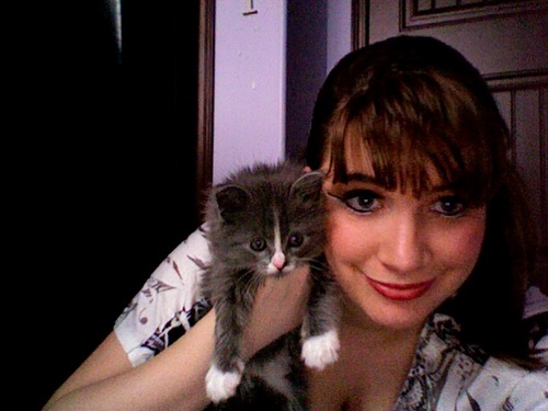 I love long walks on the beach and I love to work at the humane society and I'm a cheerleader on the rebels GO REBELS :)