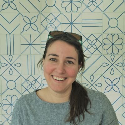 Librarian. Cat, clog, and cardigan enthusiast. Quilter. Triathlete.