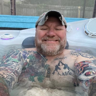 51 year old delusional male, LOL.... Quite insane, heavily inked, bald by choice, Living life on my own terms, Fuck your RULES! always up for a Naked adventure.