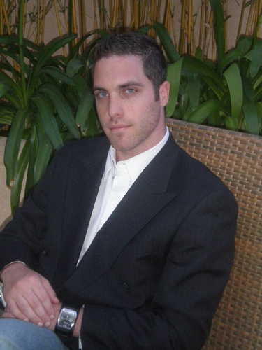 DressinLikeAMan's profile picture. He who is in charge of helping men look there best by making some subtle (and not-so-subtle) adjustments to their dress code, without using the word fuschia.