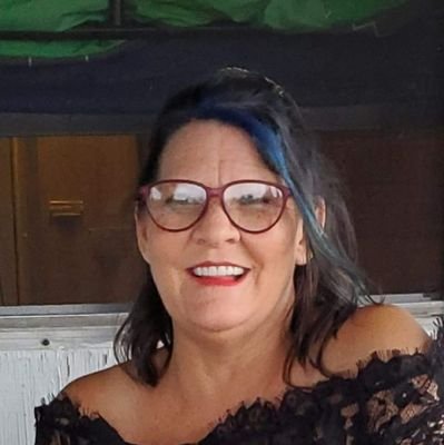 Wife, mother, grandmother, witch, chicken farmer, gardener.