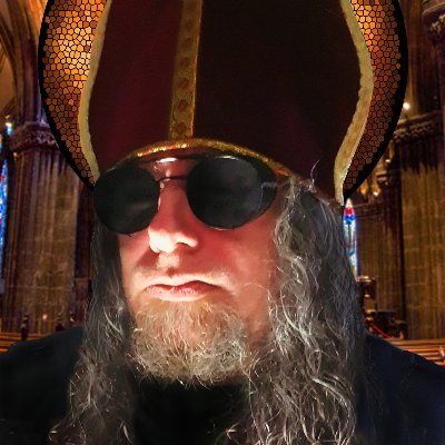 Griff-fon. Diplomant for Planet Dominion (see Youtube channel). Pseudo gaming aficionado, Alt-Pope, Metalhead, goth, cartoonist, novelist and comic nut.