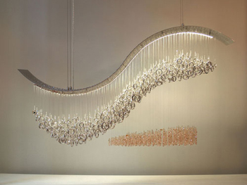 designer for a collection of modern water-inspired chandeliers...this one? crashing wave...the feminine curve of an ocean wave just as it reaches the shoreline